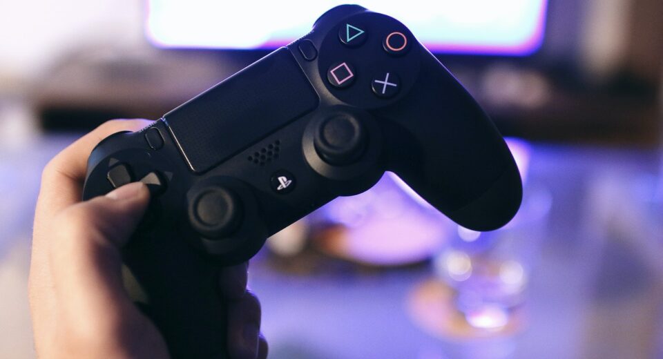 Photo by JÉSHOOTS: https://www.pexels.com/photo/person-holding-sony-ps4-dualshock-4-21067/