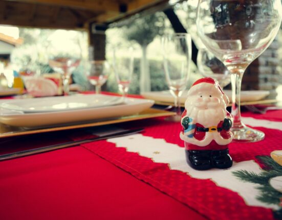 Photo by Nicolas Postiglioni: https://www.pexels.com/photo/santa-claus-ceramic-figurine-next-to-wine-glasses-and-white-ceramic-plate-824306/